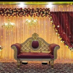 Maroon sofa floral curtain